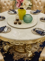 Ensemble table et chaises de salle à manger en marbre sculpté de style européen avec fonction mobile pour usage en restaurant TR05