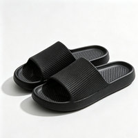 Sandales plates noires en EVA souple personnalisées pour femmes, à enfiler, avec bride texturée, pour la maison, les vacances en bord de mer, le quotidien, vente en gros
