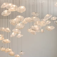 Lustre LED moderne noir et or, luminaire suspendu géométrique pour hôtel à plafond haut, grand lustre long personnalisé en acrylique pour escalier