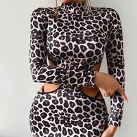 Robe mini moulante sexy pour femme à imprimé léopard, col montant, manches longues, extensible, avec découpes latérales style string, robe de lingerie, tenue de club