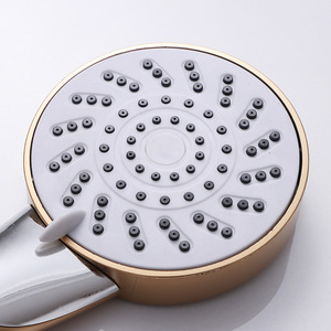 Cabezal de Ducha Manual Redondo de Plástico con Acabado de Latón, Fácil de Limpiar, para Uso en Baño - Product Image 1