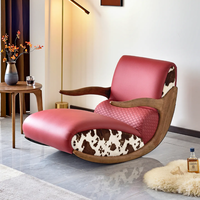 Fauteuil à bascule extensible en bois de style nordique moderne et luxueux avec revêtement en cuir rembourré pour