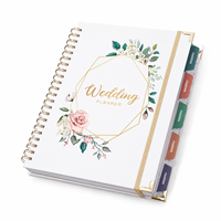 Carnet de planification de mariage OEM avec couverture blanche et motifs floraux, fabriqué par le fabricant
