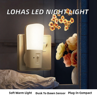 Lampe de nuit à capteur crépusculaire à LED blanc chaud LOHAS, à brancher, à intensité variable, avec matériau ABS et design moderne pour chambre à coucher