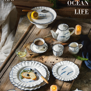 Juego de Café y Té de Porcelana con Borde Dorado, Ecológico, con Diseños de Peces, para Momentos Relajantes de Té y Café - Product Image 6