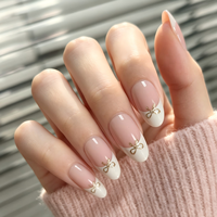 Faux ongles à presser en amande, personnalisés, marque privée, nude, français, avec nœud doré, pailletés et brillants, vente en gros