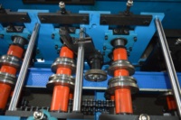 Machine de formage de rouleaux de volets roulants entièrement automatiques haute performance Machine de fabrication de portes à lattes en métal