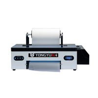 Imprimante DTF automatique F30 A3 avec tête d'impression Epson, garantie de 3 ans, utilise de l'encre DTF et du film PET pour l'impression de t-shirts et de vêtements personnalisés.