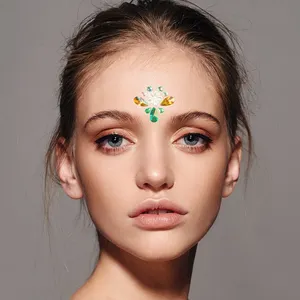 Vente en gros d'autocollants de pierres précieuses pour le visage et le corps scintillants autocollants de sourcils en strass cristal scintillant tatouage temporaire pour la fête du festival