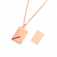 Nuevo Collar Magnético de Acero de Titanio UIONEN - Medallón Personalizable con Grabado DIY para Carta de Amor, Estilo Clásico, Fundición China