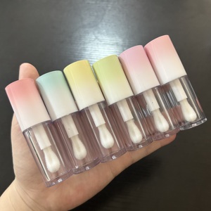 ISMAN ขายส่งหลอดลิปกลอสสีไล่ระดับขนาด 4 มล. 6 มล. แบบใหม่ ขวดคอนซีลเลอร์ทรงกลมแบบเปล่า พร้อมแปรงขนาดใหญ่ รับทำโลโก้ตามสั่ง - Product Image 1