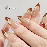 Ongles courts à pression en amande ongles artificiels personnalisés automne hiver pointe française brune motifs de faux ongles pré-collés avec des paillettes