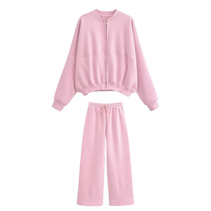 Conjunto de pantalón y top para mujer, disponible en stock, con cremallera, manga larga, estilo casual para otoño/invierno, ropa urbana con logo bordado. - Product Image 1