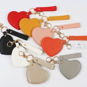 Wholesale <b>Cute</b> Heart Pu Leather Keychain Portable Cosmetic Mirror Pendant Customizable Fashion Bag Charm <b>Keyring</b> - Product Image 1