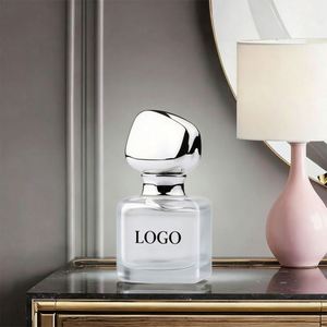 Wholesale Factory Custom Irregular Frosted Glass Perfume Bottles 100ml with <b>Silver</b> Geometric Cap for Gift Packaging - Product Image 2