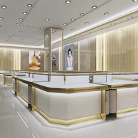 Comptoir de présentation de bijoux en verre rectangulaire en métal doré personnalisé à LED pour centre commercial vitrine de bijoux pour bijouteries
