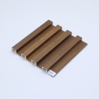 Panneau mural élégant et luxueux en WPC, résistant aux chocs, imperméable, ignifuge, à grain de bois, sans formaldéhyde, pour l'intérieur