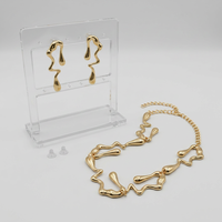 Ensemble de bijoux modernes en métal liquide, collier et boucles d'oreilles, motif vague abstrait, goutte d'eau irrégulière, doré, pour femme, accessoires de fête et quotidiens