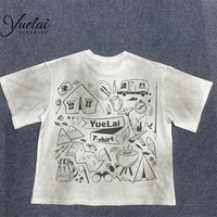 T-shirt col rond noir oversize en coton épais, imprimé DTG, coupe carrée, manches courtes, motif graphique, effet délavé et usé