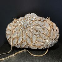 Sac de soirée de luxe pour femme, orné de feuilles et de fleurs incrustées de diamants, pochette de banquet dorée, sac à main en strass, boîte métallique ajourée élégante