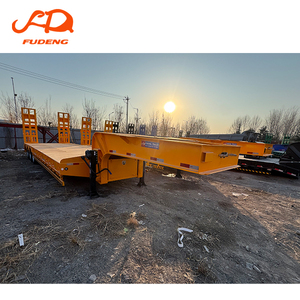Semirremolque de plataforma baja de 3 ejes BPW/FUWA con capacidad de carga personalizable, guardabarros laterales plegables y suspensión de ballestas/neumática - Product Image 2