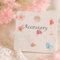 Carte de présentation pliable en papier d'art avec logo personnalisé, gaufrée et débossée, pour pinces à cheveux, chouchous et bijoux