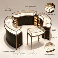 Ensemble de vitrine à bijoux incurvée, cadre en métal or champagne, dessus en verre trempé, base de rangement noire, éclairage LED, îlot à bijoux complet