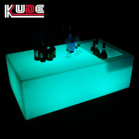 Table de bar LED rectangulaire lumineuse avec seau à glace intégré et rainures pour refroidir bière et vin, idéale pour les soirées