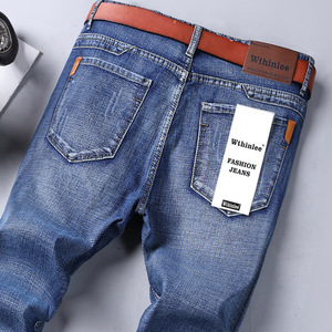 Pantalones <span class=keywords><strong>vaqueros</strong></span> informales de otoño para <span class=keywords><strong>hombre</strong></span>, pantalones <span class=keywords><strong>vaqueros</strong></span> gruesos sueltos de pierna recta de cintura media, pantalones de mezclilla elásticos ajustados, lavado medio - Product Image 3