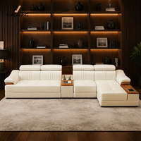 Sofa Sudut Modern Tiga Dudukan Berbentuk L dari Kulit Asli Warna Beige dengan Sandaran Kepala yang Dapat Disesuaikan, Penyimpanan Konsol, dan Pelapis Busa.