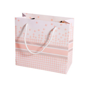 Sacs en papier biodégradables personnalisés pour l'emballage de vêtements, sacs cadeaux cosmétiques en petites séries avec impression couleur et gaufrage - Product Image 1