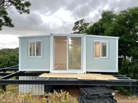 Maison conteneur pliable imperméable en panneaux sandwich préfabriqués de conception moderne pour usage hôtelier