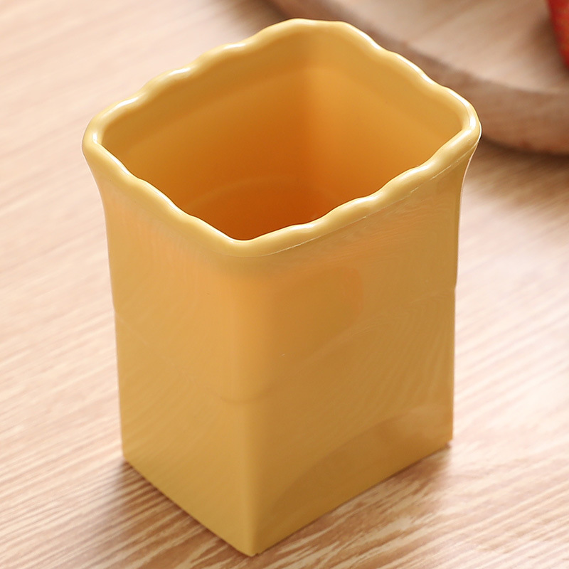 Coupe-fruits jaune à 4 lames [sachet individuel]