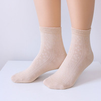 Chaussettes mi-mollet en soie de mûrier pour femmes, douces pour la peau, ajourées, respirantes, à motif floral en maille