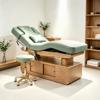 Lit de massage électrique professionnel haut de gamme avec dossier réglable, cadre en bois et chauffage, idéal pour hôtels, salons et centres de bien-être