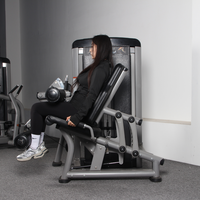 Machine de musculation pour extensions et flexions des jambes DGZ5122, équipement de fitness en promotion, pour usage domestique et commercial.