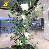 Lustre moderne en forme de ginkgo biloba, feuilles et fleurs vertes, pour atrium commercial