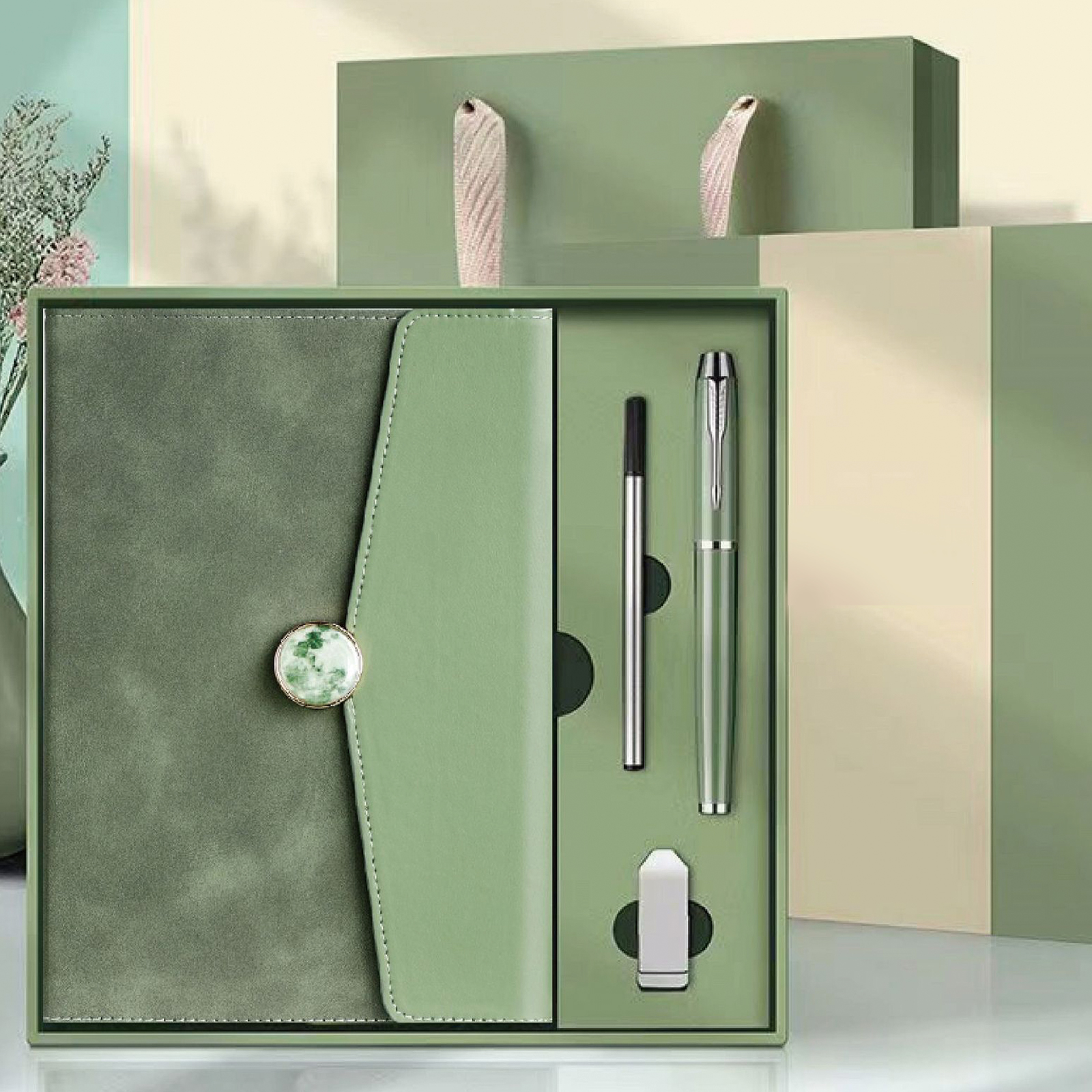 Notebook + Pen + Pen refill + USB drive