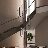 Lustre ovale noir minimaliste simple moderne pour villas en duplex et appartements loft avec long plafond