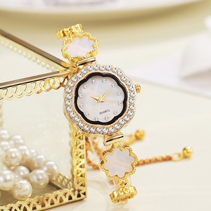 <span class=keywords><strong>Montre</strong></span> pour <span class=keywords><strong>femme</strong></span> Fenyi, style décontracté tendance, <span class=keywords><strong>bracelet</strong></span> <span class=keywords><strong>fin</strong></span> en forme de coquille avec cordon de serrage réglable et diamants - Product Image 1