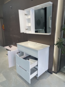 Simple white <b>freestanding</b> <b>bathroom</b> vanity with integrated sink and soft closing storage drawers - Product Image 5