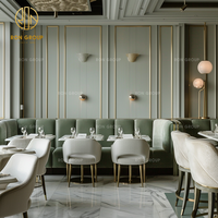 Mobilier de restaurant Ron Group : banquette en velours, table carrée en marbre, chaise personnalisée pour restaurant