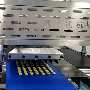 Wanli Group Machine automatique de découpe de gâteaux pour cupcakes Nouvel équipement de boulangerie utilisant des ingrédients Farine Lait Eau Maïs Fruit - Product Image 3