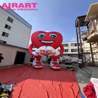 Personnage gonflable publicitaire en forme de cœur rouge sur mesure, ballon gonflable en forme de cœur de personnage de dessin animé