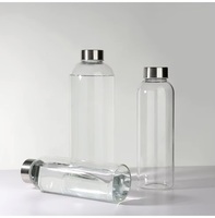 Bouteille d'eau en borosilicate d'hydrogène de taille personnalisée bouteille d'eau potable en verre avec manchon 500ml 750ml 1000ml