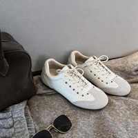 Baskets décontractées rétro pour femmes, style brogue perforé, à lacets, bicolores, basses, à semelle plate, inspirées des baskets allemandes