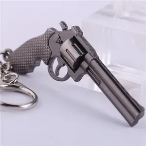 Portachiavi personalizzato in metallo in lega di zinco con Mini pistola galvanica di alta qualità