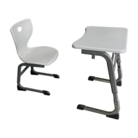 Meubles de classe modernes, bureau individuel réglable en hauteur en plastique ABS, chaises en PP, structure en acier pour salle de classe primaire