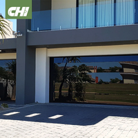 Porte de garage sectionnelle moderne en aluminium noir avec verre trempé pleine vue, sur mesure, certifiée CE, vente en gros, OEM, pour villa
