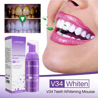 Mousse de blanqueamiento de dientes multiusos púrpura V34, producto de cuidado bucal de uso doméstico rápido para eliminar manchas amarillas
